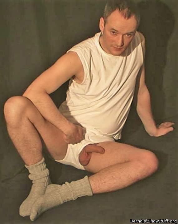 Berndis: balls and uncut Penis with foreskin out of shorts (1999)