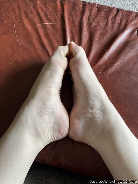Cute little feet! Love to have my cock between them