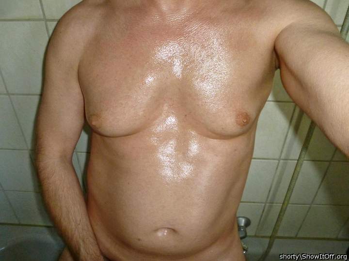shaved and oiled chest
