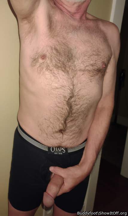 Handsome hairy chest and beautiful cock sticking out there.
