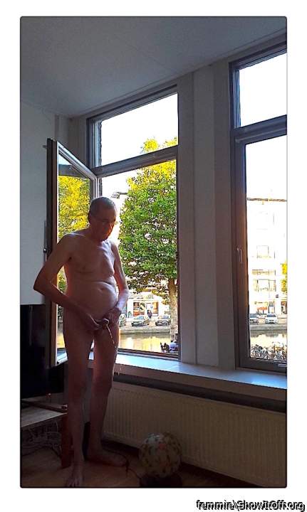 cumming in full view of street and houses