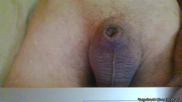 My small cock tucked in.