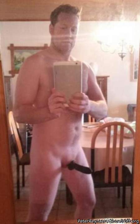 Wearing a rubber penis sleeve over my cock