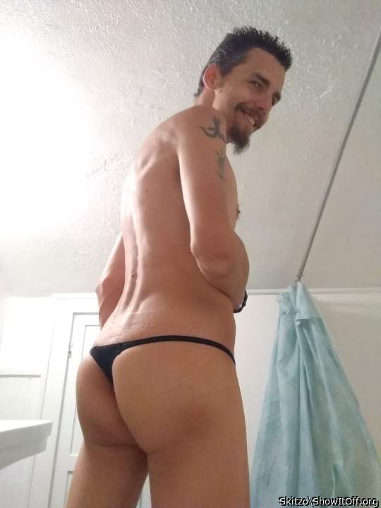 My little round ass in a black micro thong!