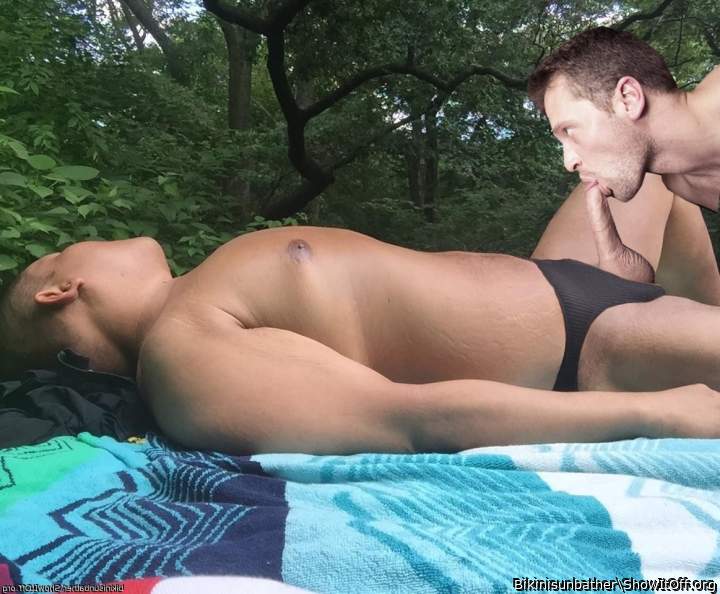 getting sucked while sunbathing