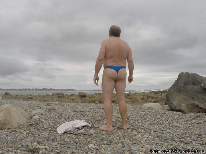 Ass in thong on public beach