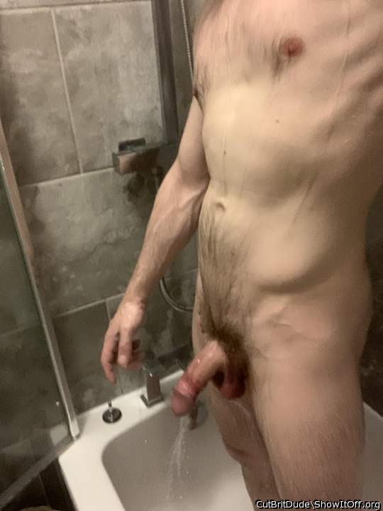 Sexy nude body and cock, all wet.  