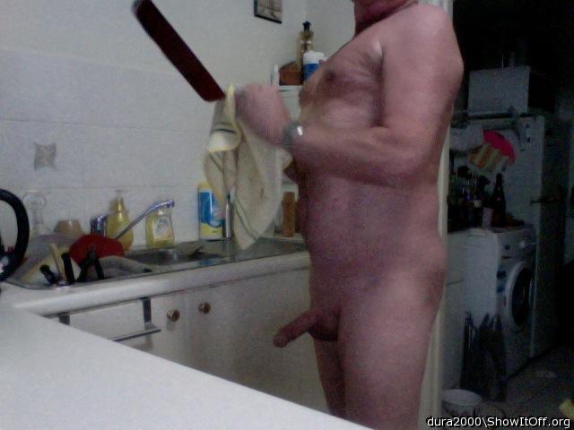 Washing up naked.
