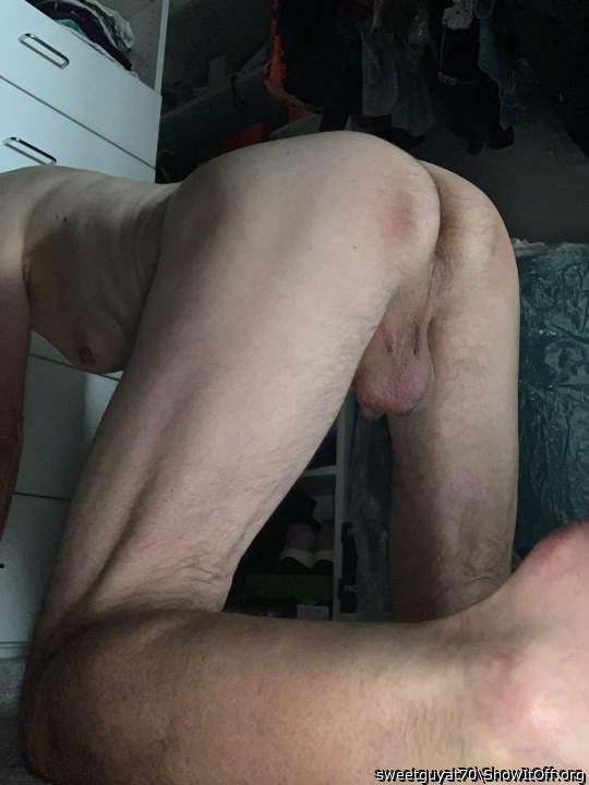 Hands and knees in the closet