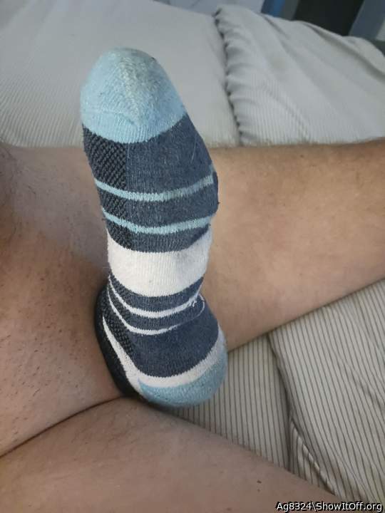 Beautiful picture.I use to wear Sox on my cock when is very 
