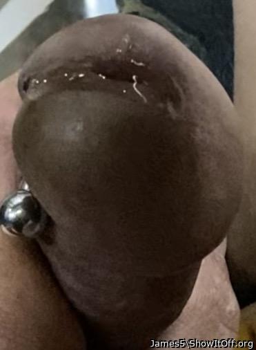 Playing with my frenum and pre-cum.