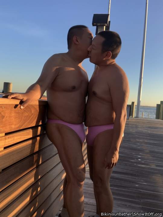 Kissing by the pier