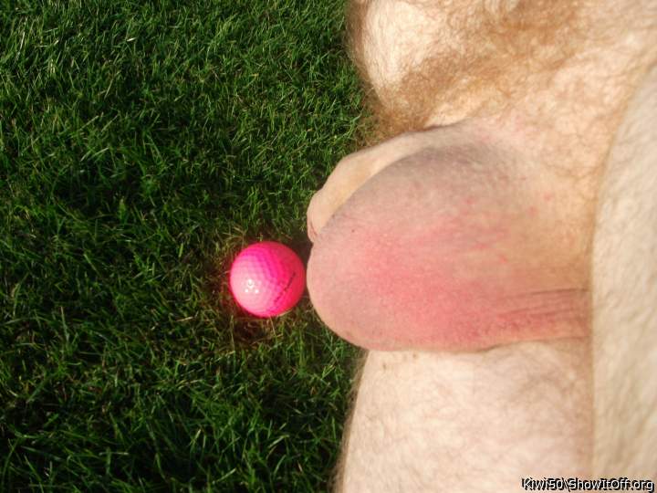 A golf ball with my balls out in the sun.