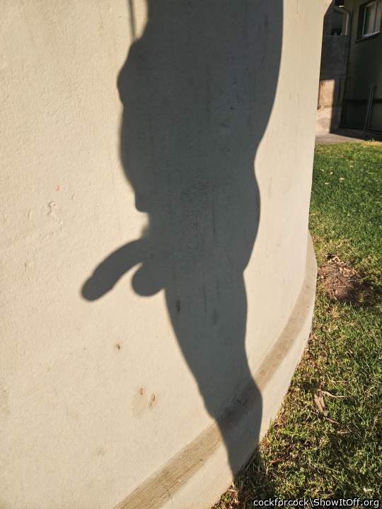 My silhouette against a wall