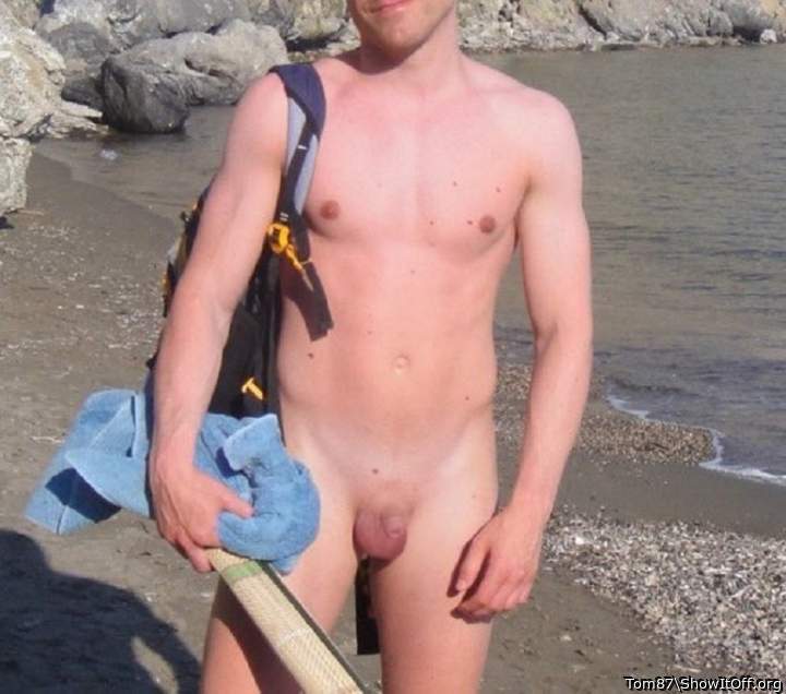 Showing off my stick on the nudist beach for all to see