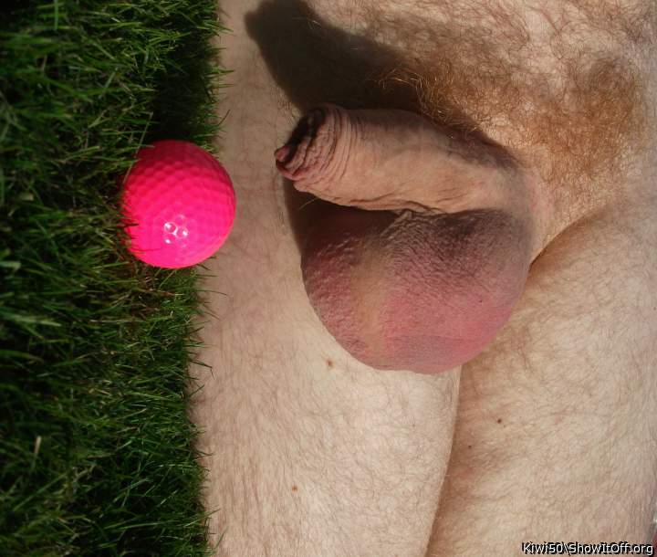 A golf ball with my balls out in the sun.