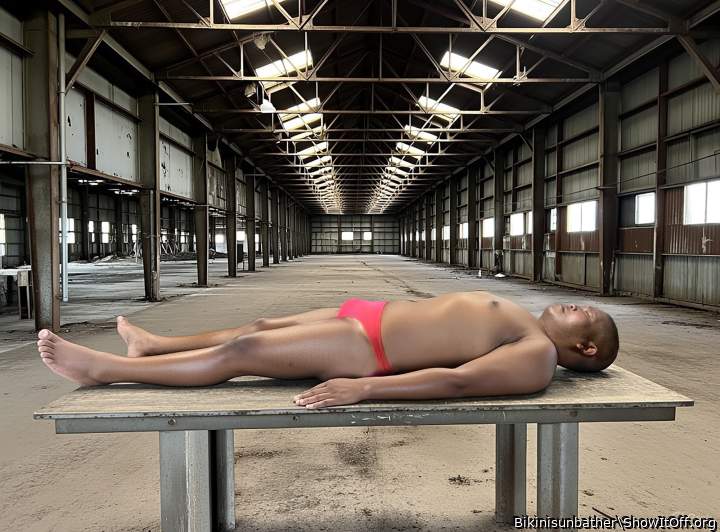 unconscious on the table in pink thong