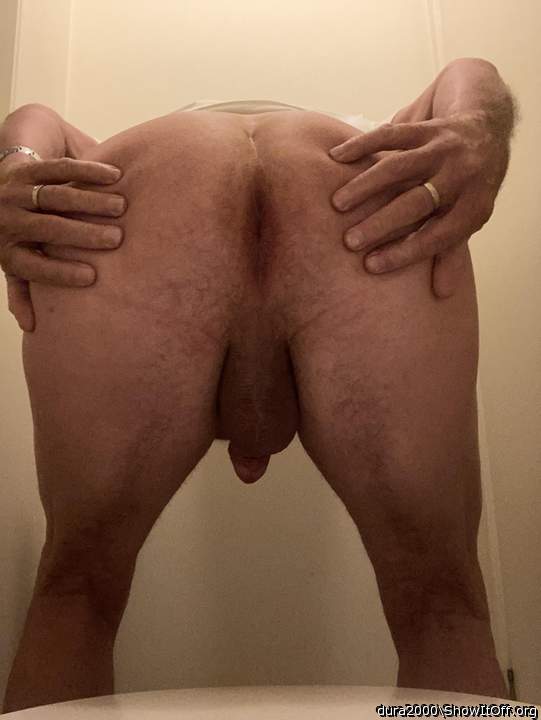 Bum, balls and cock.
